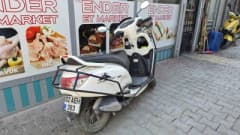 Adıyaman Eskisaray Mahallesi Gölbaşı Caddesi'nde otomobil ile motosikletin çarpıştığı trafik kazası