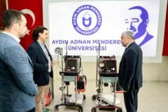 Aydın Adnan Menderes Üniversitesi Tıp Fakültesi binası ve sağlık çalışanları