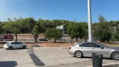 Antalya Kepez Santral Mahallesi'nde çıkan orman yangınına müdahale eden itfaiye ekipleri ve hava araçları