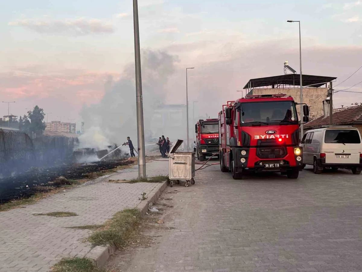 Aydın’ın Efeler ilçesinde evlere yakın otluk alanda çıkan ve rüzgarın etkisiyle kısa sürede geniş alana yayılan yangın,