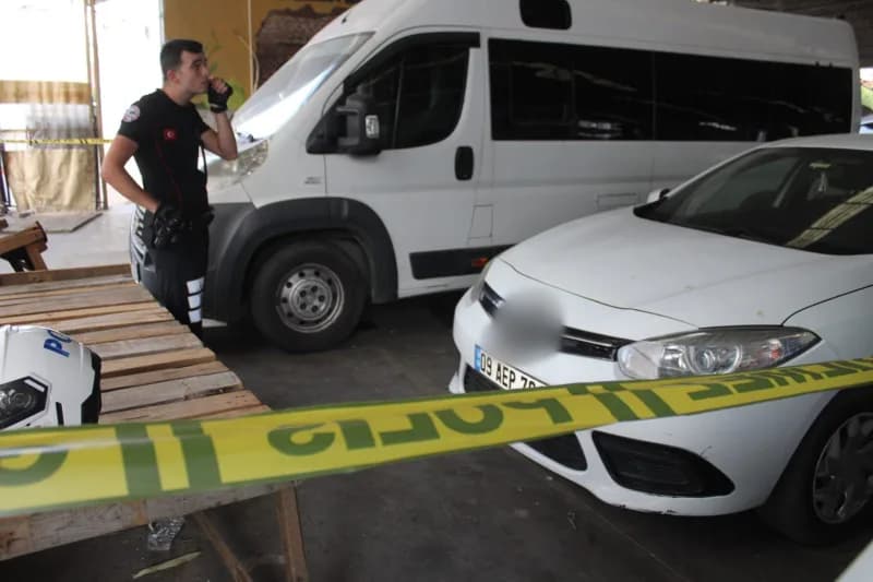 Aydın'ın Efeler ilçesinde polis ekipleri tarafından, bir okulun önünde park halindeki bir aracın altına gizlenmiş bir ad