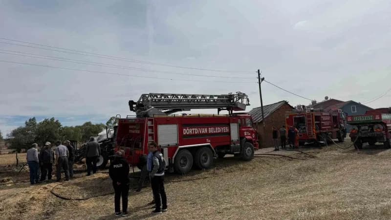 Bolu’da saman balyalarının bulunduğu alanda çıkan yangında traktör ve römorku kullanılamaz hale geldi.