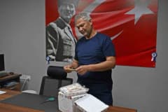 Antalya Büyükşehir Belediyesi mezarlık ekipleri depremde cenaze nakli hizmeti verirken