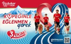 Bursa Hüdavendigar Parkı’nda düzenlenen Eker I Run Köpeğin İle Koş etkinliğinde koşan köpekler ve hayvanseverler