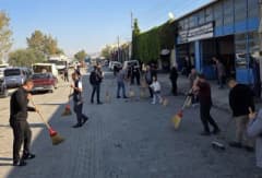İnegöl’de Dünya Temizlik Günü kapsamında esnaflar ve öğrenciler çevre temizliği yapıyor