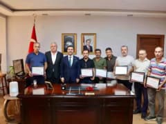 Koçarlı Kaymakamı Ramazan Taşkın ve esnaf temsilcileri toplantıda bir arada