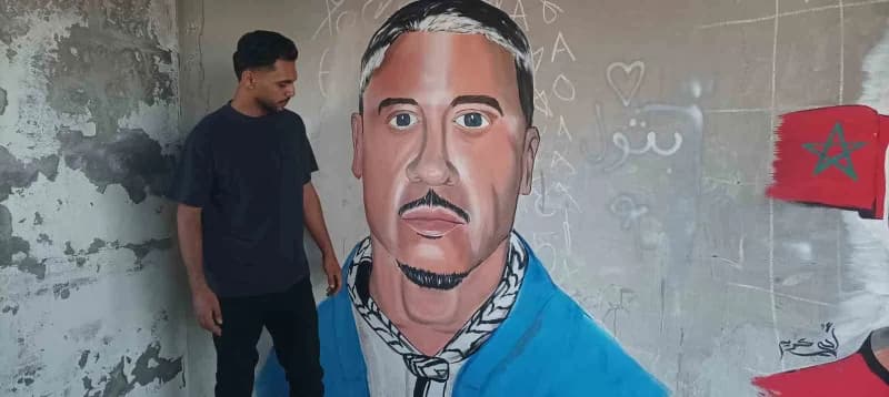 İsrail saldırılarının sürdüğü Gazze Şeridi'nin batısındaki Al-nasr Mahallesi'nde, 21 yaşındaki Filistinli sanatçı Aby Qe