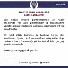 Emniyet Genel Müdürlüğü binası önünde polis araçları ve görevli polisler