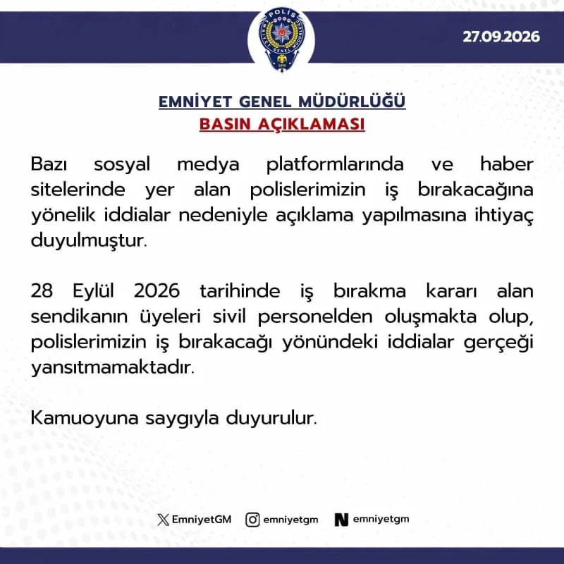 Emniyet Genel Müdürlüğü binası önünde polis araçları ve görevli polisler