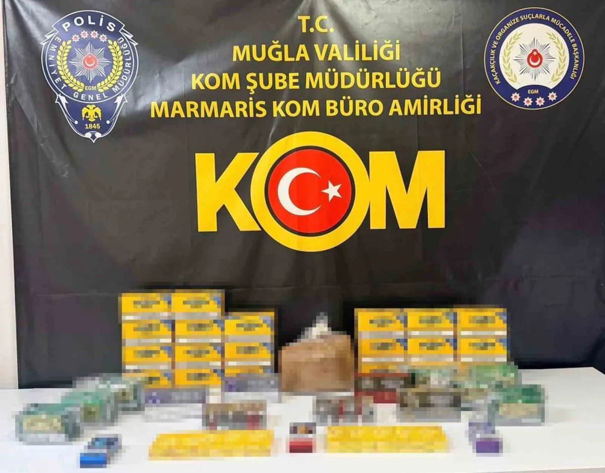Muğla Marmaris’te kaçak tütün operasyonunda ele geçirilen sahte bandroller ve tütün ürünleri