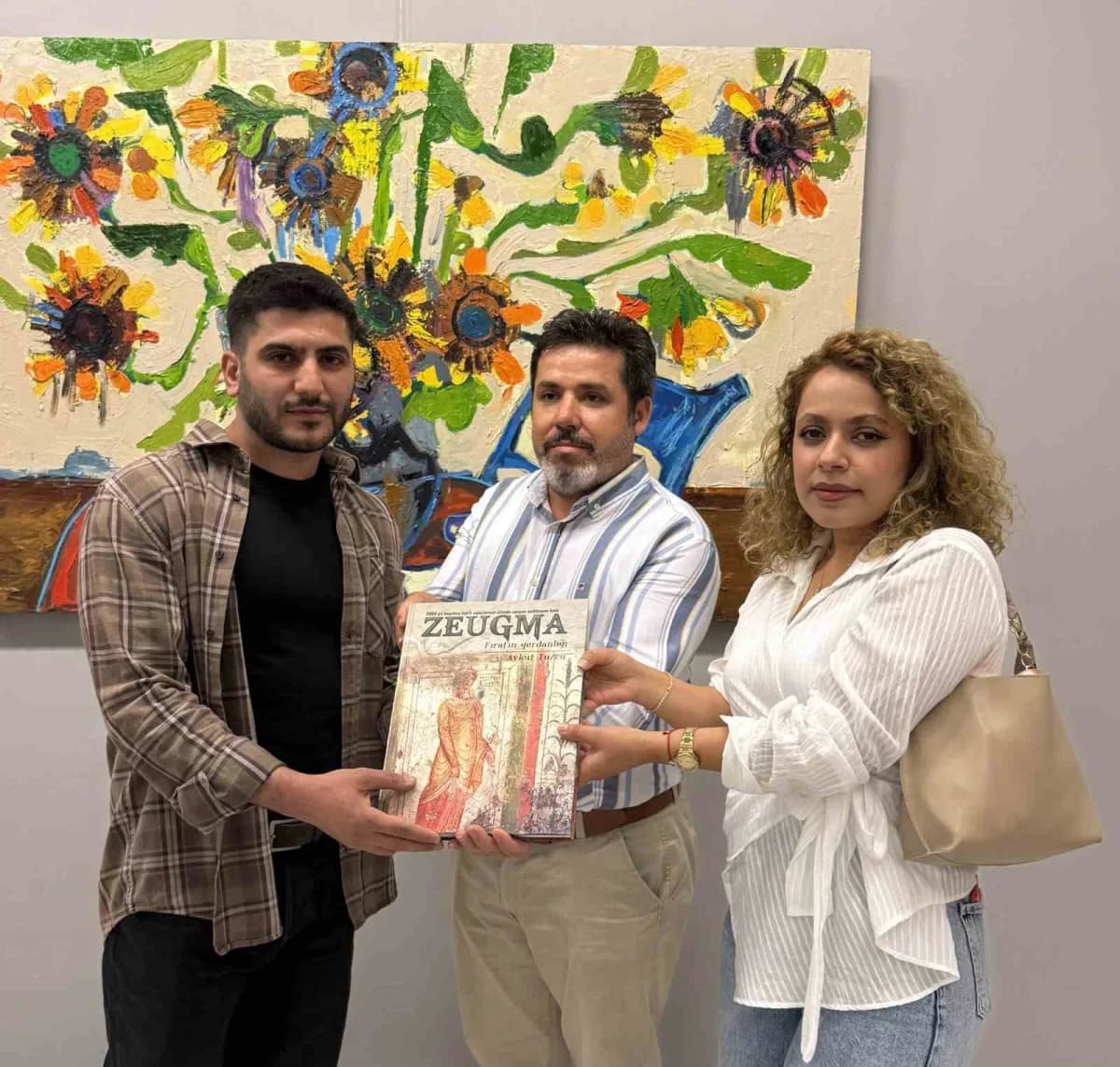 Ressam Talha Kılıç, yağlı boya tekniği ile yaptığı 13 eserden oluşan "Tragedyalar" isimli kişisel resim sergisini SANKO
