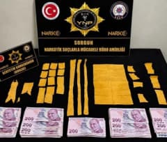Yozgat Sorgun ilçesinde düzenlenen uyuşturucu operasyonunda ele geçirilen sentetik kannabinoid ve para