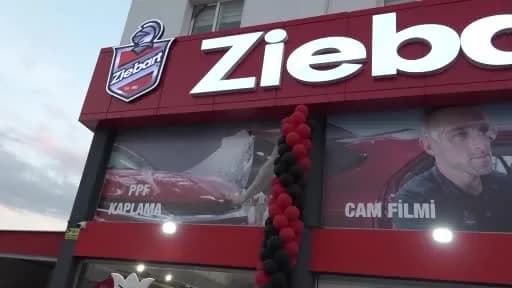 Ziebart Lefkoşa araç koruma merkezinin modern dış görünümü ve açılış töreninden görüntü