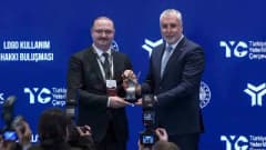 Atatürk Üniversitesi Rektörü Prof. Dr. Ahmet Hacımüftüoğlu, Çalışma Bakanı Prof. Dr. Vedat