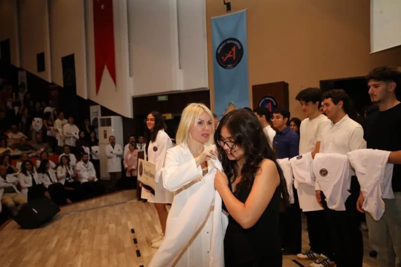 Rektör Prof. Dr. Özkan cübbe giydirdi