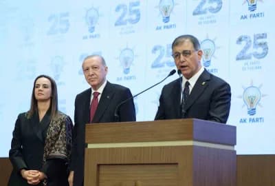 Cumhurbaşkanı Recep Tayyip Erdoğan, AK Parti Kongre Merkezi’nde Cemil Tugay’a parti rozetini takarken