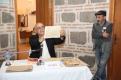 Manisa Tarzanı ve işgal dönemi arşiv belgelerinin paylaşıldığı Kurşunlu Han Şiir Evi'nde düzenlenen söyleşi