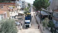 Manisa Turgutlu Türkmen Yolu’nda sıcak asfalt serimi yapan iş makineleri ve yol çalışması