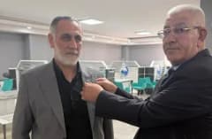 Ağrı Ticaret ve Sanayi Odası binası önünde yeni yönetim kurulu üyeleri