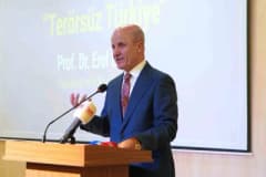 YÖK Başkanı Erol Özvar Marmara Üniversitesi akademik yıl açılış töreninde konuşma yaparken