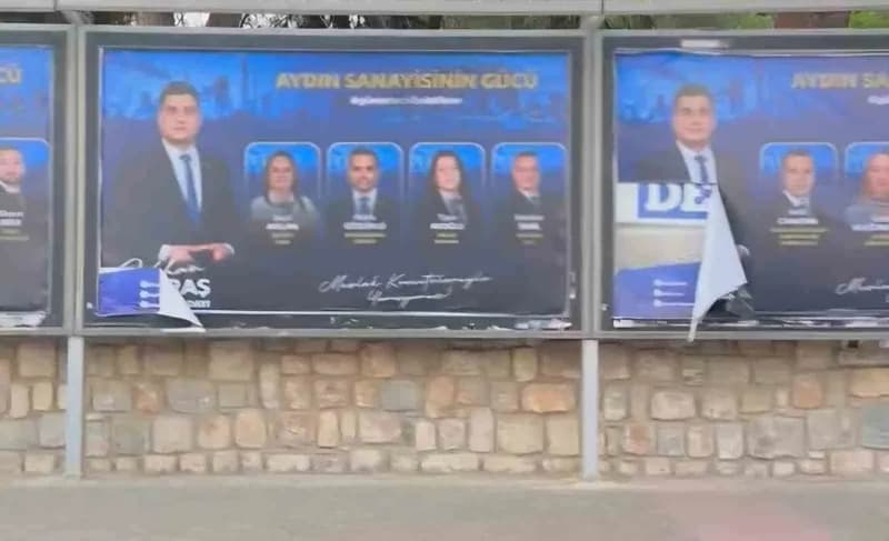 Aydın Sanayi Odası Başkanı Gökhan Maraş’ın seçim afişlerinden biri, yırtılmış ve zarar görmüş halde billboardda
